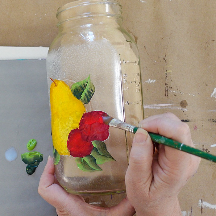 glass painting, painting more red on strawberries