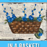 blue flowers in a basket painted in acrylics
