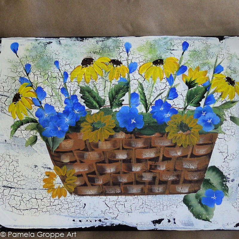 underpainting the daisies with yellow ocher in acrylics, paint daisies in a basket