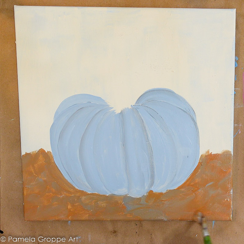 blue pumpkin painted on creamy background with brown at bottoms