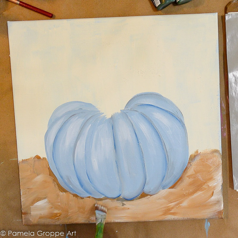 Lightening base area under blue painted pumpkin