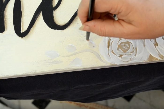 paint subtle vines and leaves for boho roses with gold and white paint