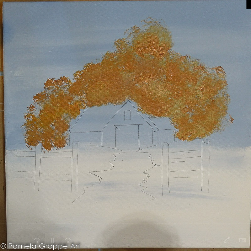 mounds of tan acrylic color sponged on blue sky to mimic fall trees