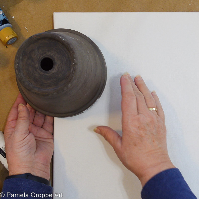 using an upside down flower pot to draw a circle