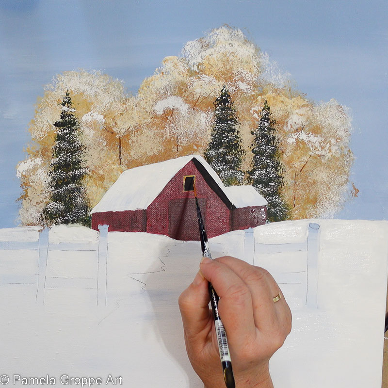 hand painting window trim on barn in tan color