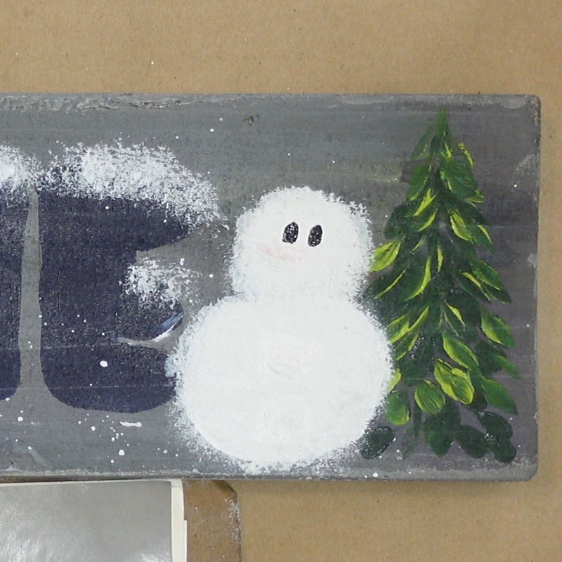 add to oval dots to snowman face for eyes